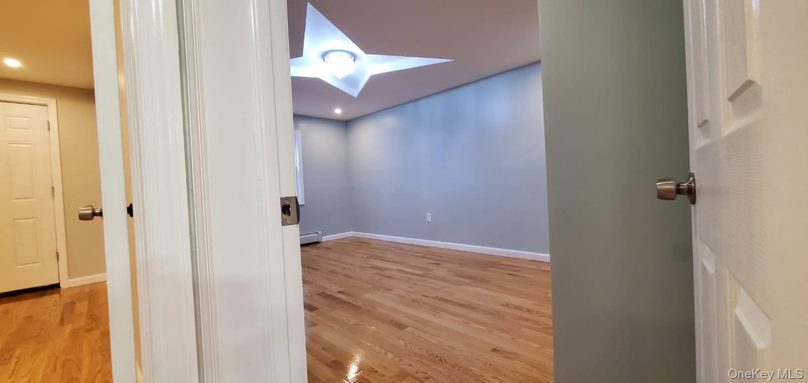 914 Duncan Street Bronx, NY 10469 - Photo 4 of 10 a view of a hallway