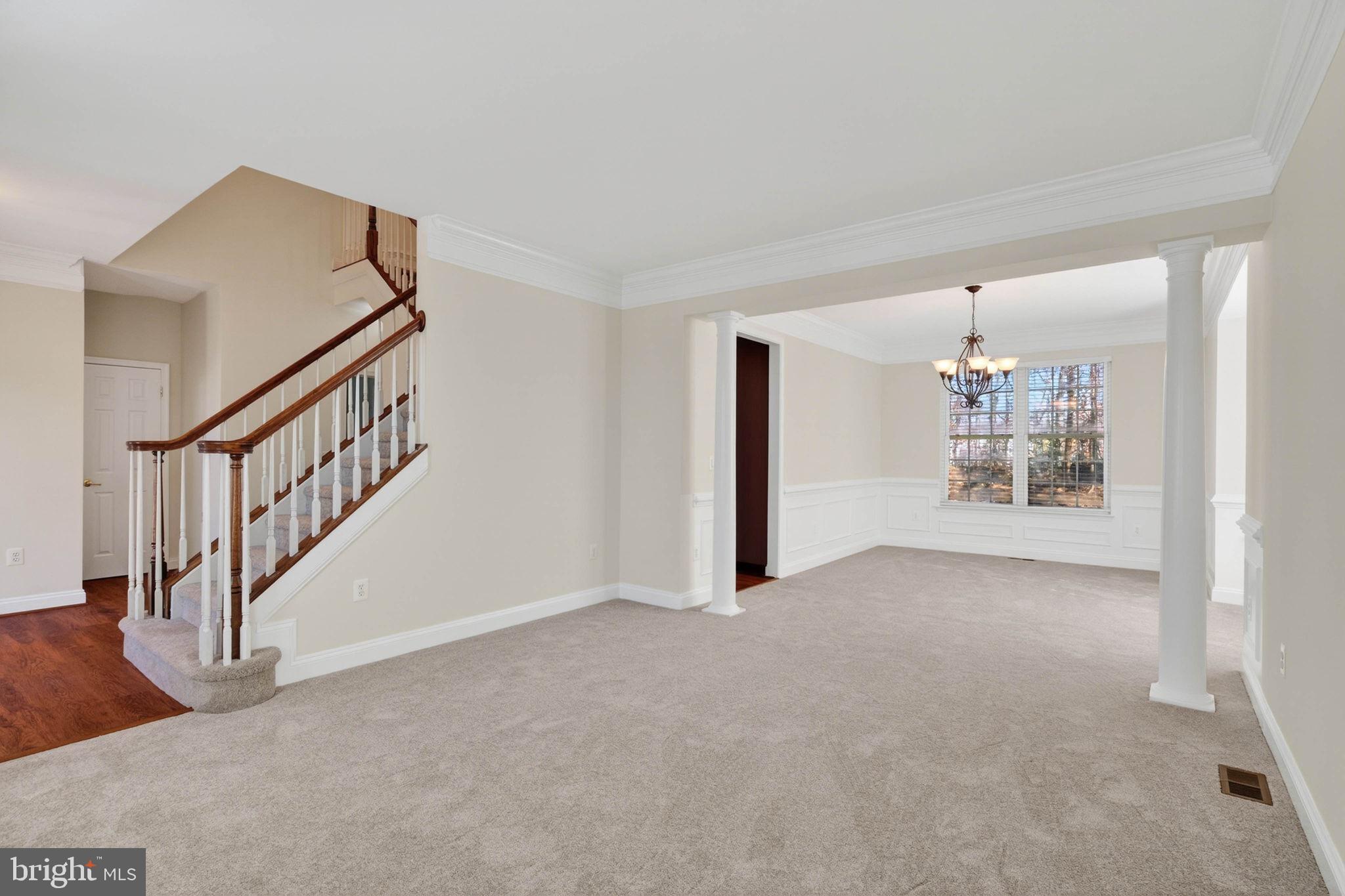 3313 Lady Catherine Circle Triangle, VA 22172 - Photo 23 of 51 a view of an empty room with stairs and white walls