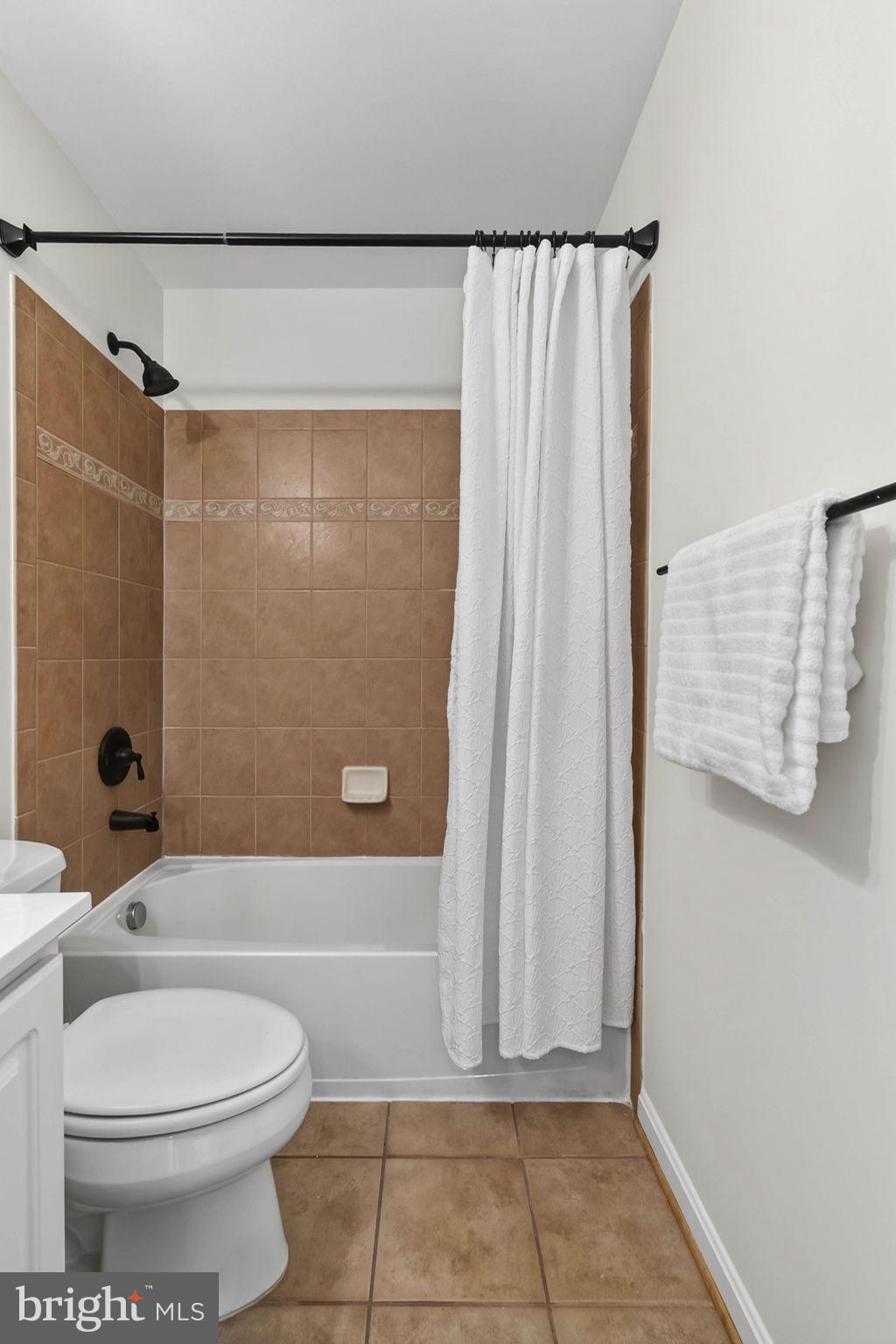 3313 Lady Catherine Circle Triangle, VA 22172 - Photo 40 of 51 a bathroom with a toilet and a shower