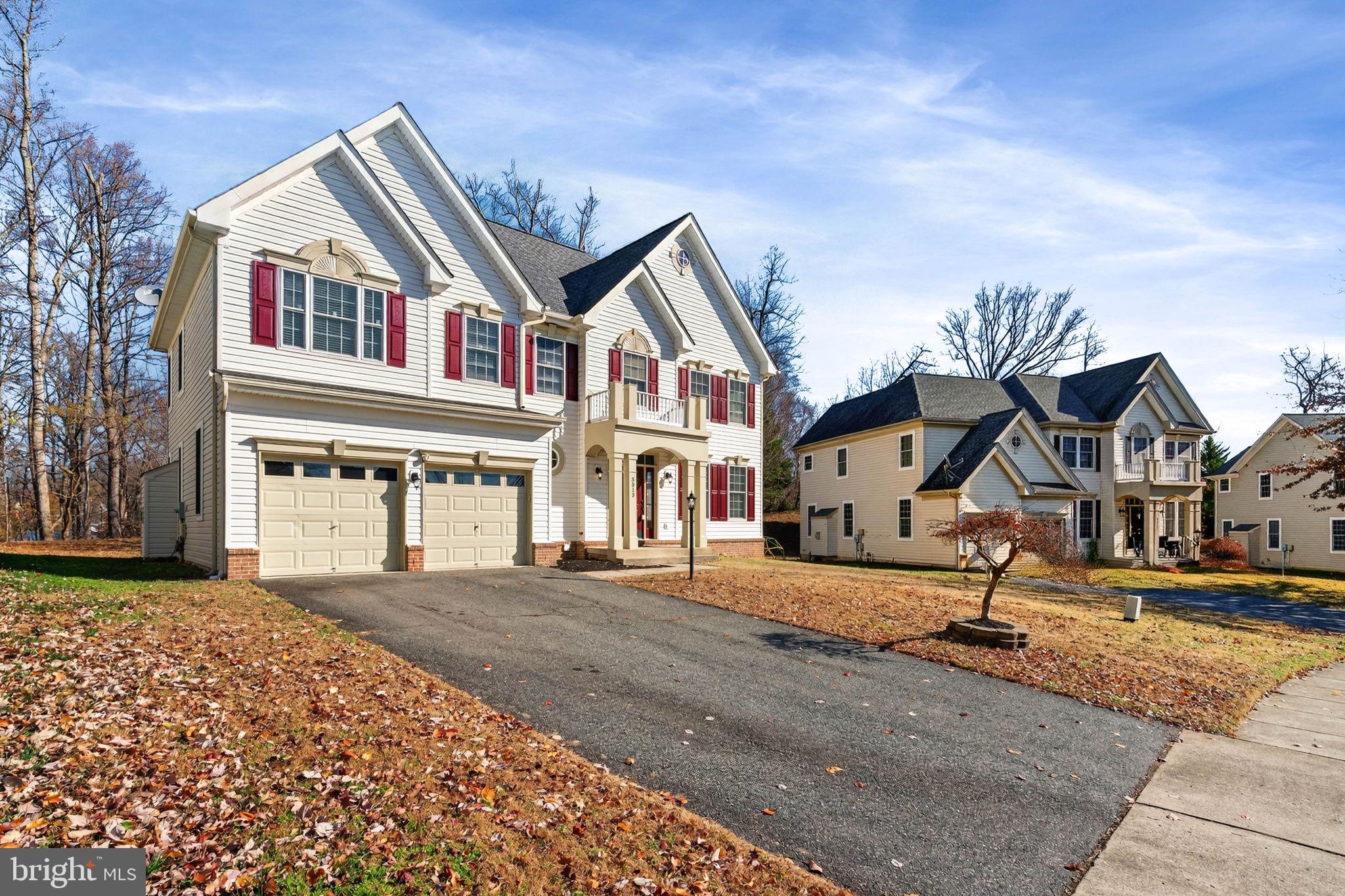 3313 Lady Catherine Circle Triangle, VA 22172 - Photo 4 of 51 a front view of a house with a yard