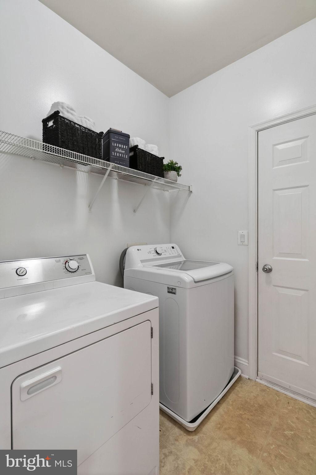 3313 Lady Catherine Circle Triangle, VA 22172 - Photo 42 of 51 a utility room with dryer and washer