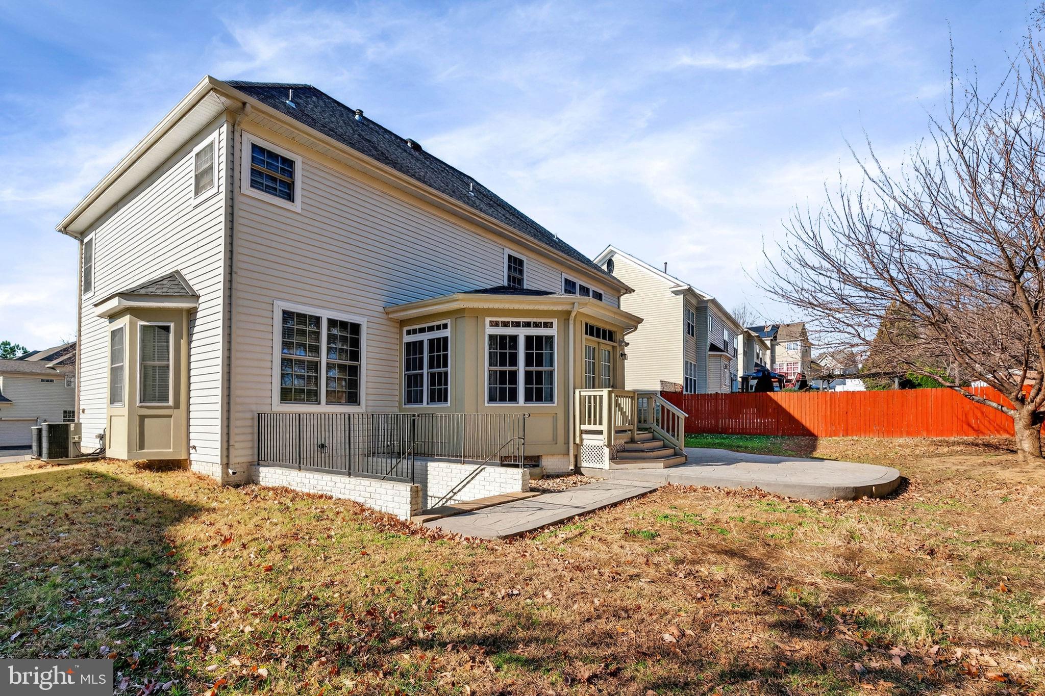 3313 Lady Catherine Circle Triangle, VA 22172 - Photo 46 of 51 a front view of a house with a yard covered in snow