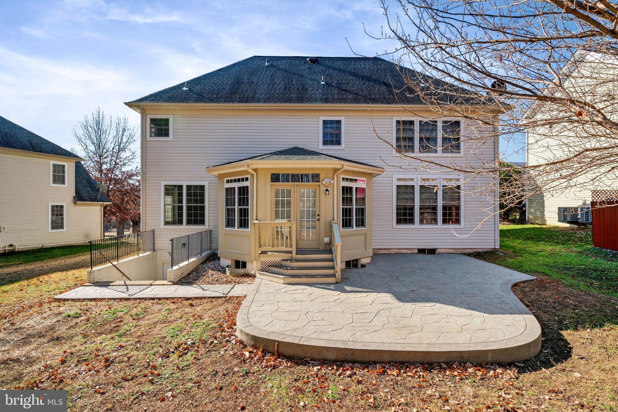3313 Lady Catherine Circle Triangle, VA 22172 - Photo 47 of 51 a front view of a house with a yard