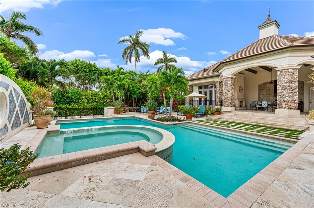 2560 Half Moon Walk Naples, FL 34102 - Photo 41 of 44 View of swimming pool featuring a patio area and an in ground hot tub