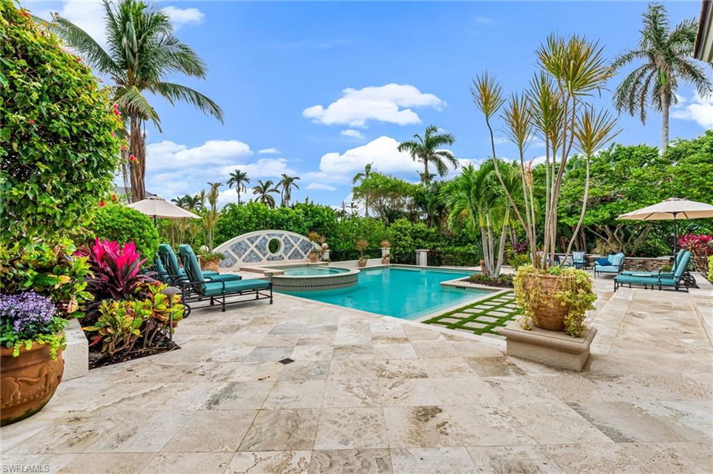 2560 Half Moon Walk Naples, FL 34102 - Photo 42 of 44 View of pool featuring an in ground hot tub and a patio