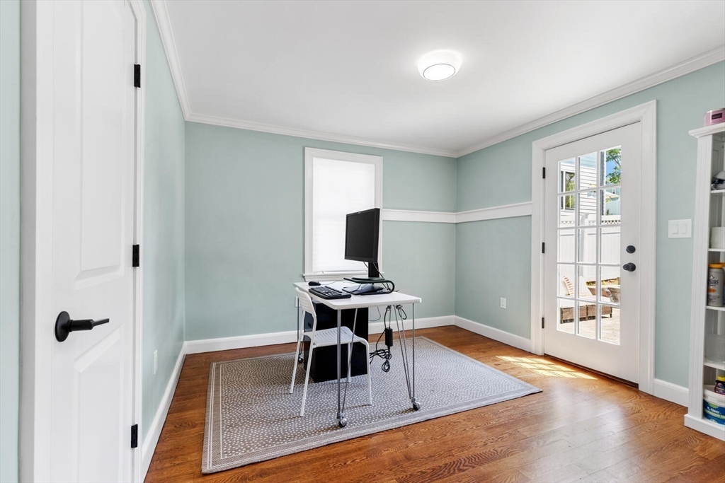 149 Robbins Road Watertown, MA 02472 - Photo 16 of 33 a living room with furniture wooden floor and a window