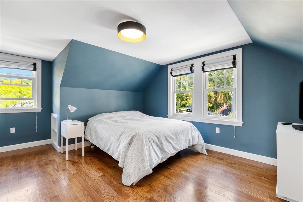 149 Robbins Road Watertown, MA 02472 - Photo 18 of 33 a bedroom with a bed and a window
