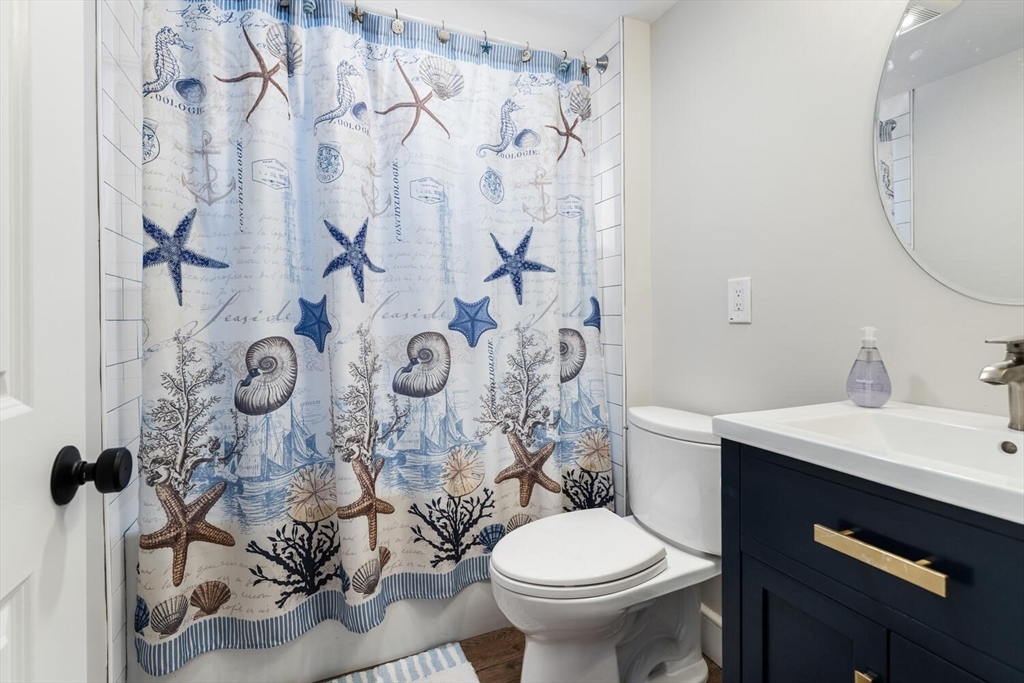 149 Robbins Road Watertown, MA 02472 - Photo 20 of 33 a bathroom with a sink toilet and shower