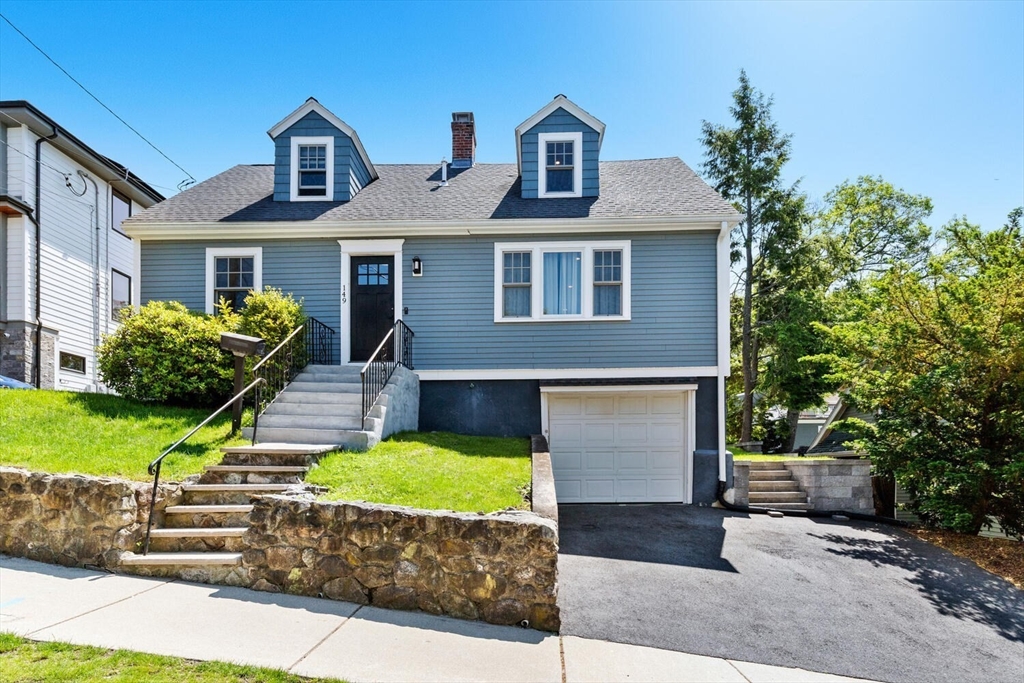 149 Robbins Road Watertown, MA 02472 - Photo 2 of 33 a front view of a house with garden