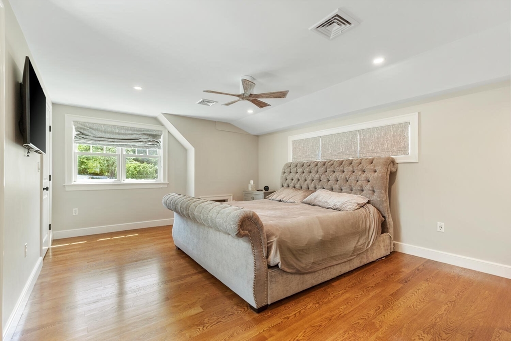 149 Robbins Road Watertown, MA 02472 - Photo 23 of 33 a spacious bedroom with a bed and window