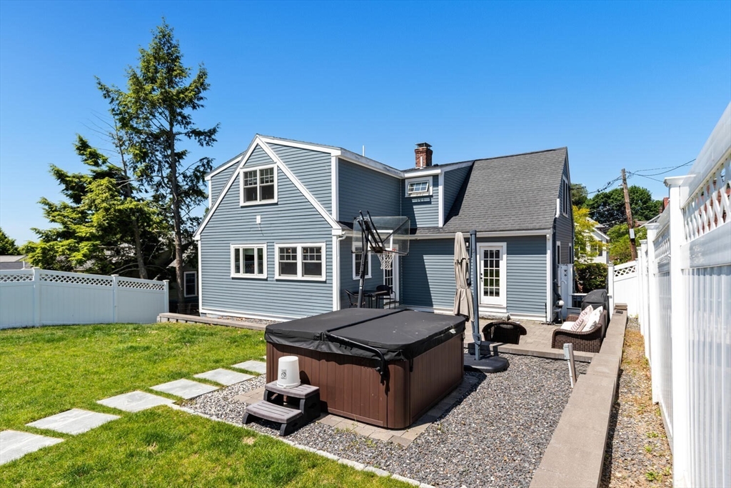 149 Robbins Road Watertown, MA 02472 - Photo 28 of 33 a view of a house with a tub and a yard