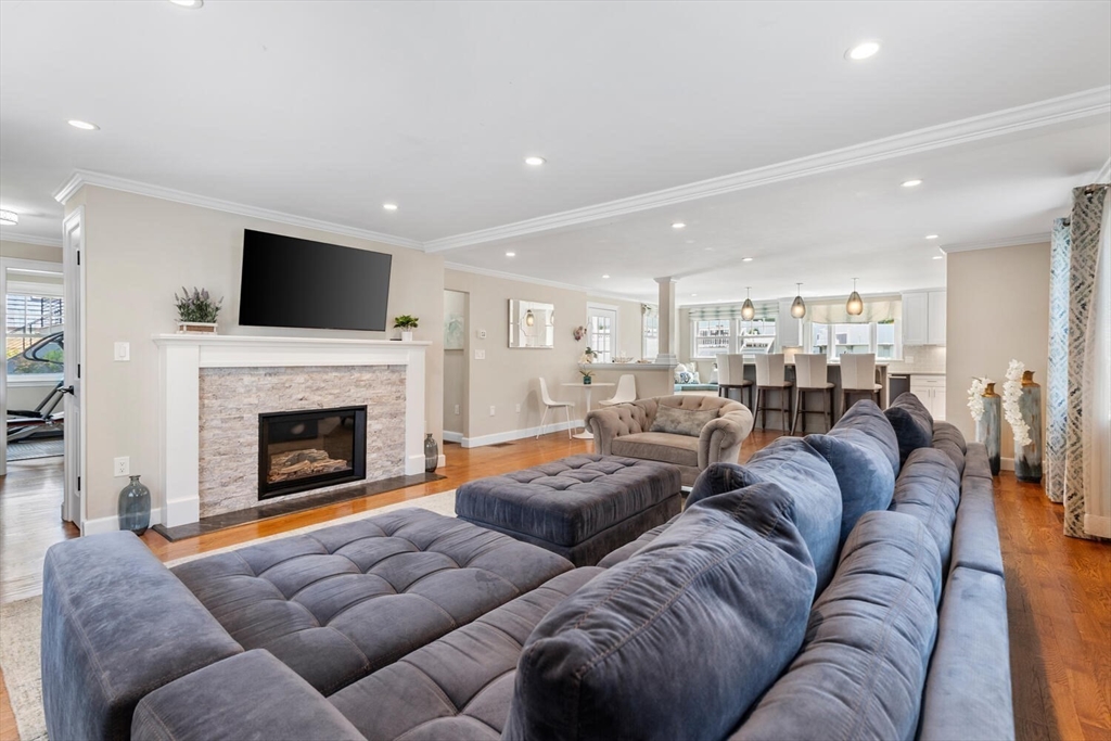 149 Robbins Road Watertown, MA 02472 - Photo 5 of 33 a living room with furniture fireplace and flat screen tv