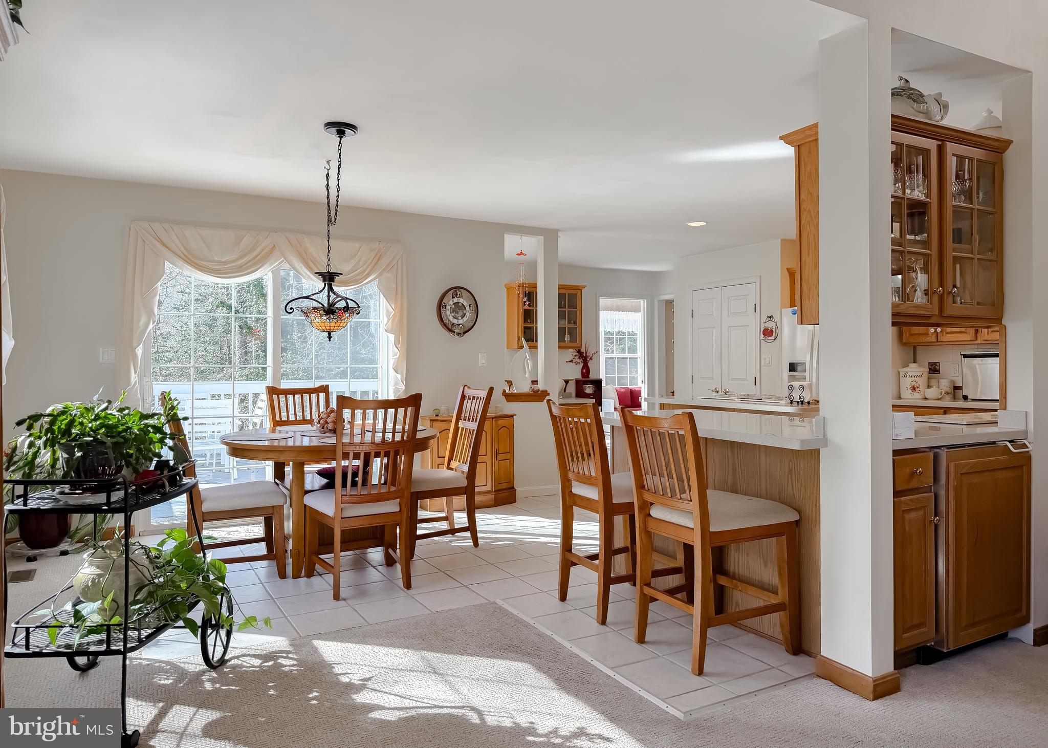 48712 Packer Court St. Inigoes, MD 20684 - Photo 17 of 55 a dinning area with furniture and chandelier