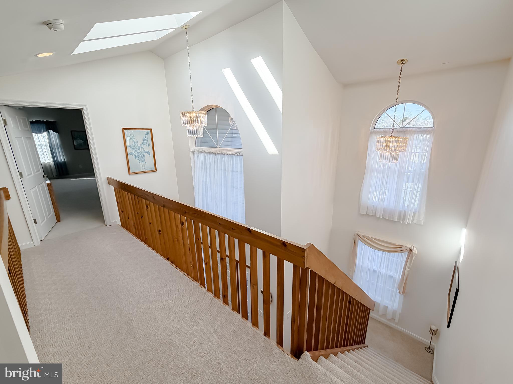 48712 Packer Court St. Inigoes, MD 20684 - Photo 43 of 55 a view of a hallway with windows and stairs
