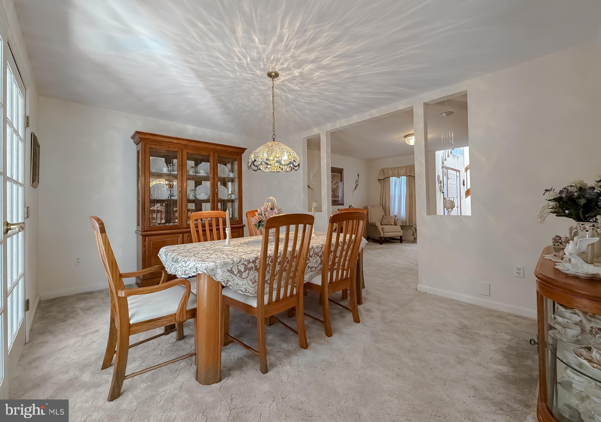 48712 Packer Court St. Inigoes, MD 20684 - Photo 8 of 55 a view of a dining room with furniture