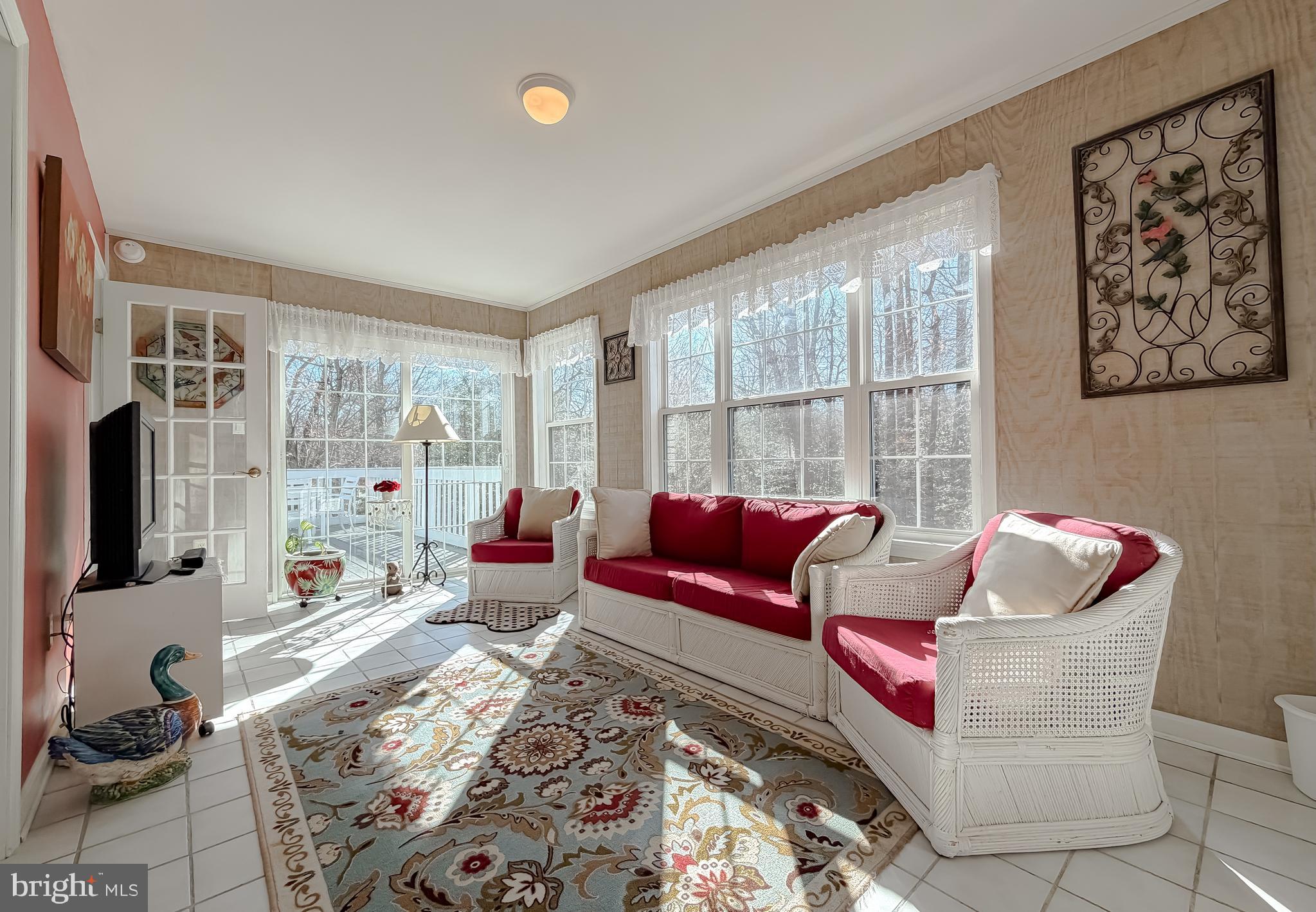 48712 Packer Court St. Inigoes, MD 20684 - Photo 10 of 55 a living room with furniture and a large window