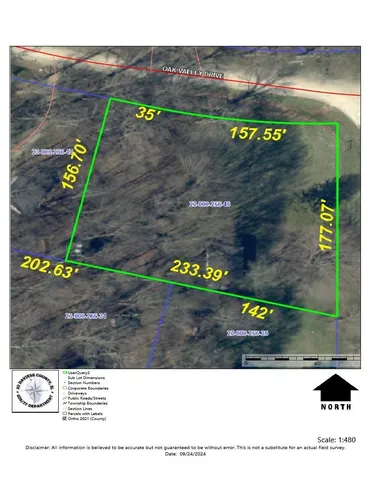 a view of a street with a park