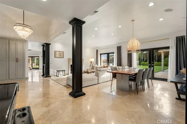 a kitchen with lots of counter top space cabinets and stainless steel appliances