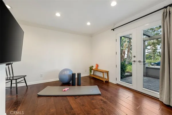 a view of a wooden house with a sink and a yard