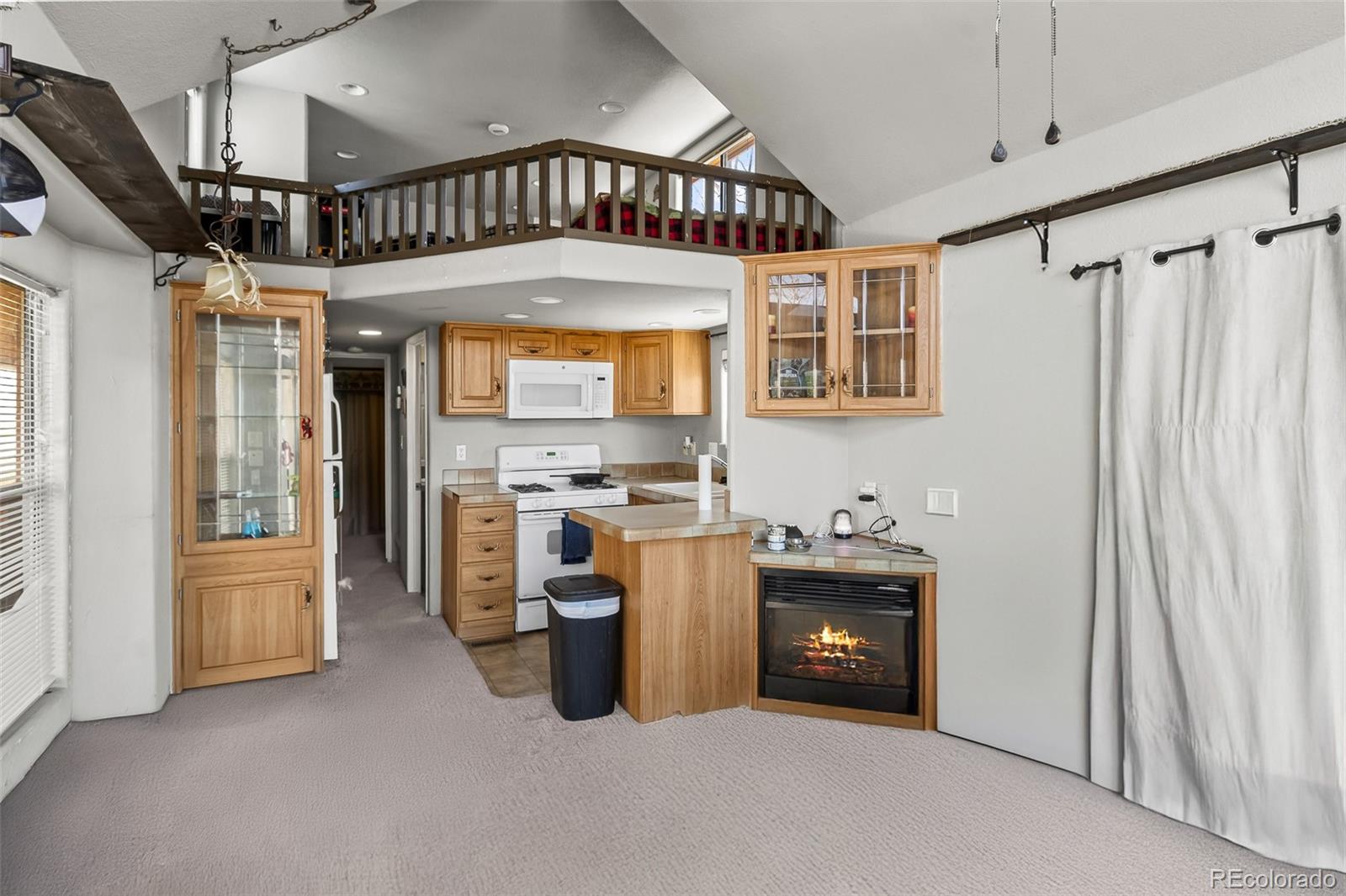 92 Sunshine Loop Fairplay, CO 80440 - Photo 15 of 30 a bathroom with a sink a window and stainless steel appliances