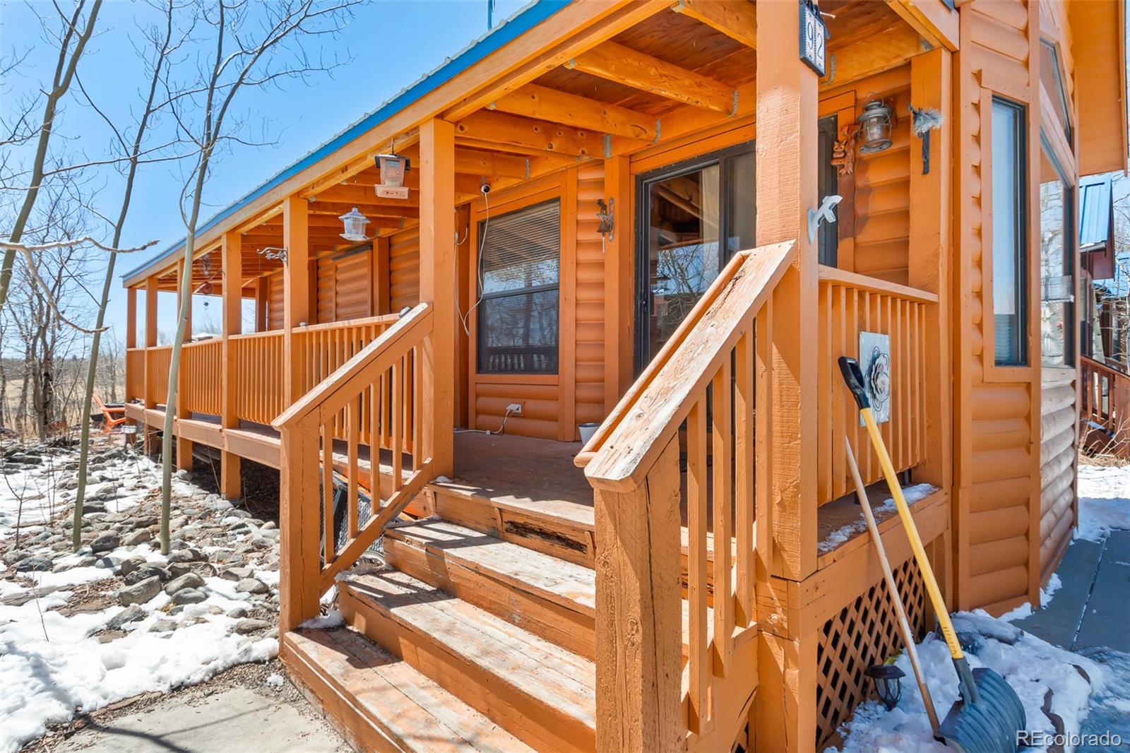 92 Sunshine Loop Fairplay, CO 80440 - Photo 4 of 30 a view of an house with wooden stairs and stairs