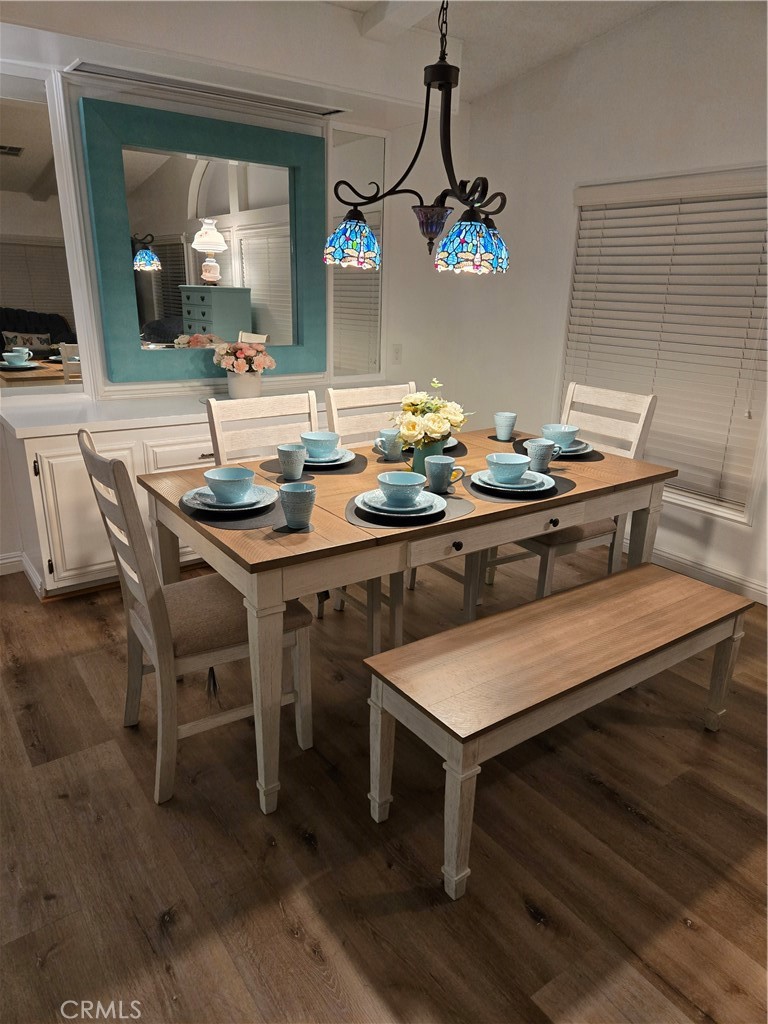 840 East Foothill Boulevard, Unit 203 Azusa, CA 91702 - Photo 2 of 21 a view of a dining room with a table and chairs