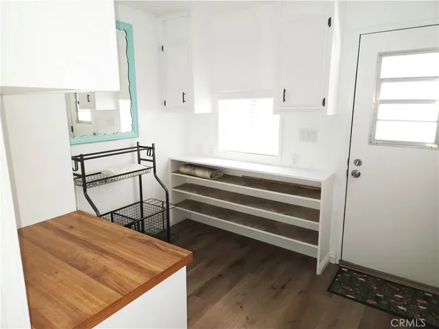 a room with stairs and a window