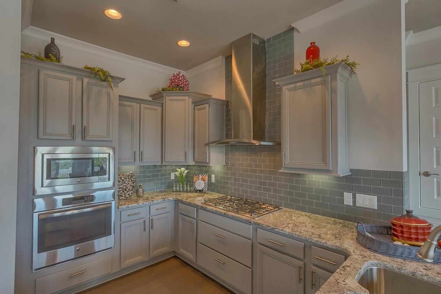 65 Pine Lands Loop Inlet Beach East, Unit C Inlet Beach, FL 32461 - Photo 3 of 47 a kitchen with stainless steel appliances granite countertop a refrigerator and a sink