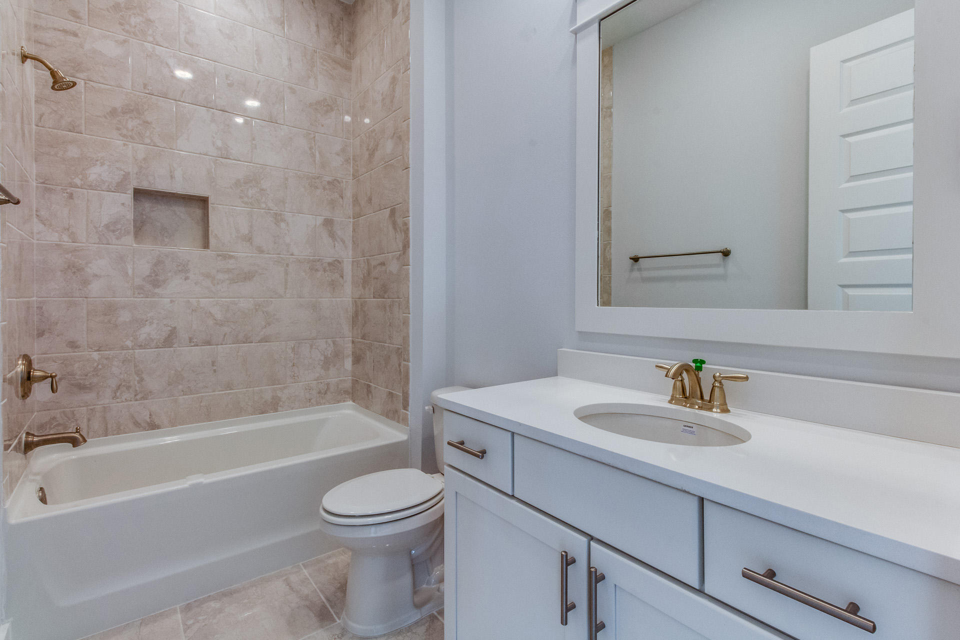 65 Pine Lands Loop Inlet Beach East, Unit C Inlet Beach, FL 32461 - Photo 33 of 47 a bathroom with a sink a toilet and shower