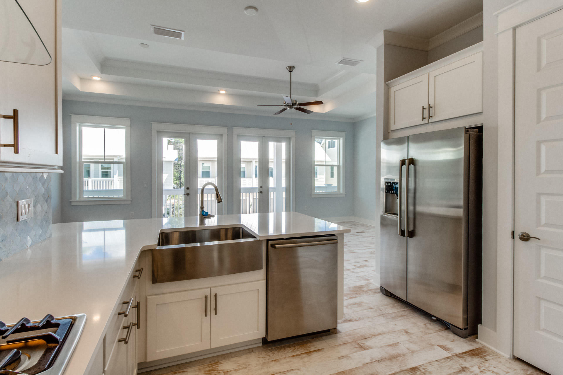 65 Pine Lands Loop Inlet Beach East, Unit C Inlet Beach, FL 32461 - Photo 36 of 47 a kitchen with a refrigerator and a sink
