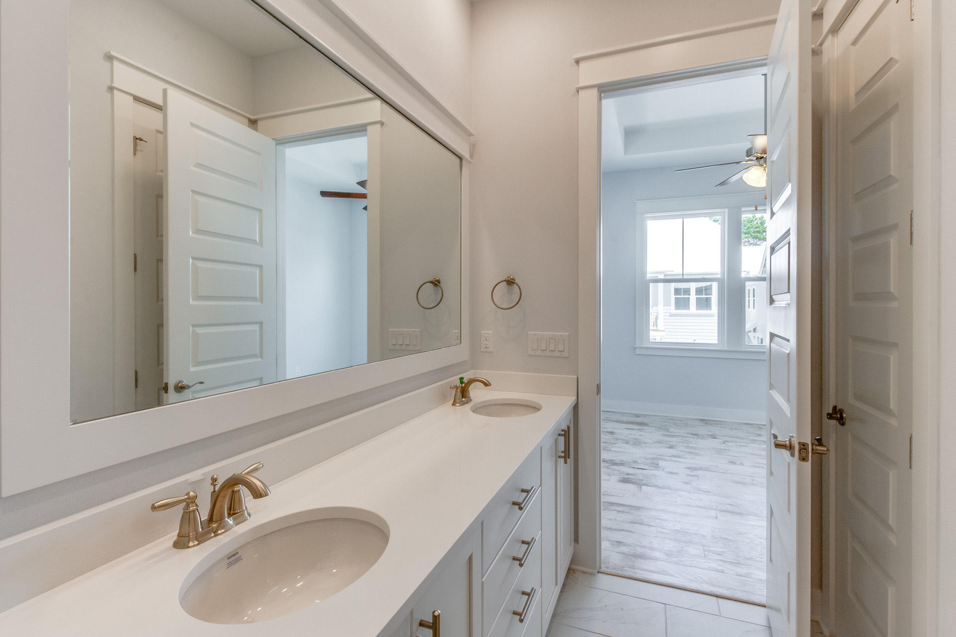 65 Pine Lands Loop Inlet Beach East, Unit C Inlet Beach, FL 32461 - Photo 41 of 47 a bathroom with a sink and a mirror