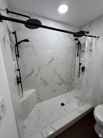 1768 West 1300th Street South, Unit 305 Springville, UT 84663 - Photo 14 of 26 Master bath double headed shower with extra flow water pressure valve. Contemporary tile surround.