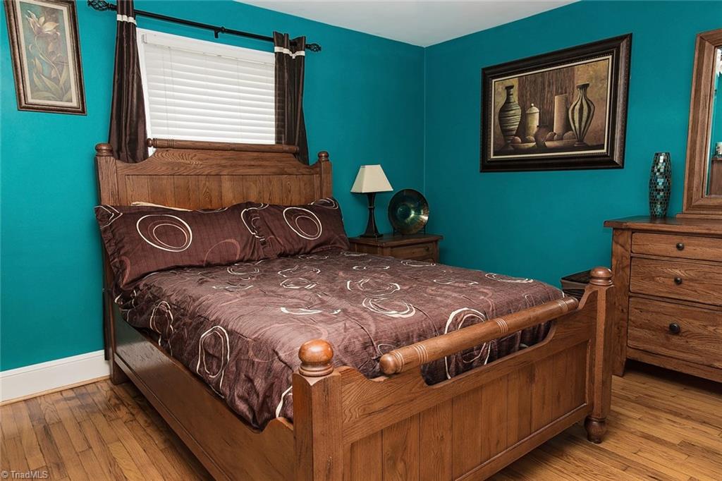 7014 Ridge Road Lexington, NC 27295 - Photo 11 of 21 Master bedroom is large and will accommodate all of your furniture.
