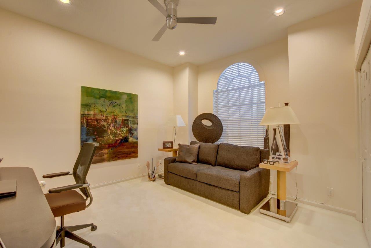 5758 Northwest 24th Terrace Boca Raton, FL 33496 - Photo 26 of 35 a living room with furniture a air conditioner and a window