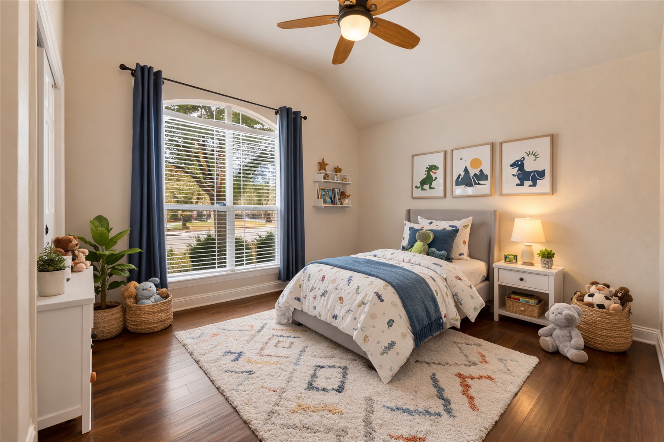 1102 Canyon Maple Road Pflugerville, TX 78660 - Photo 15 of 21 a bedroom with a bed and wooden floor