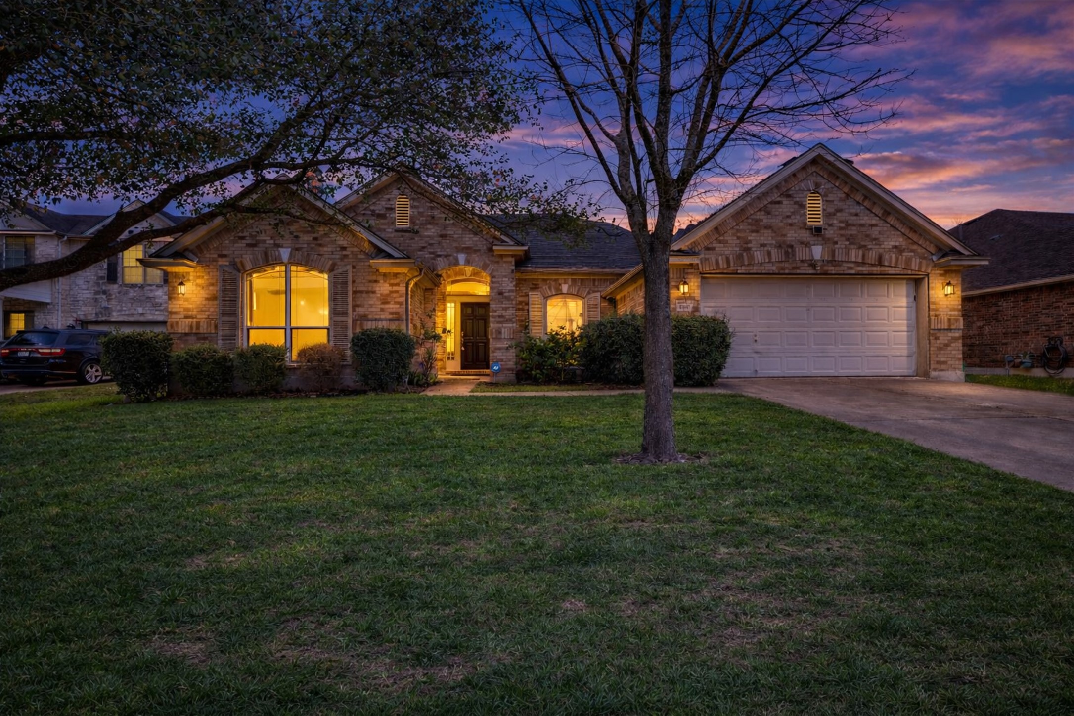 1102 Canyon Maple Road Pflugerville, TX 78660 - Photo 21 of 21 a house view with a garden space