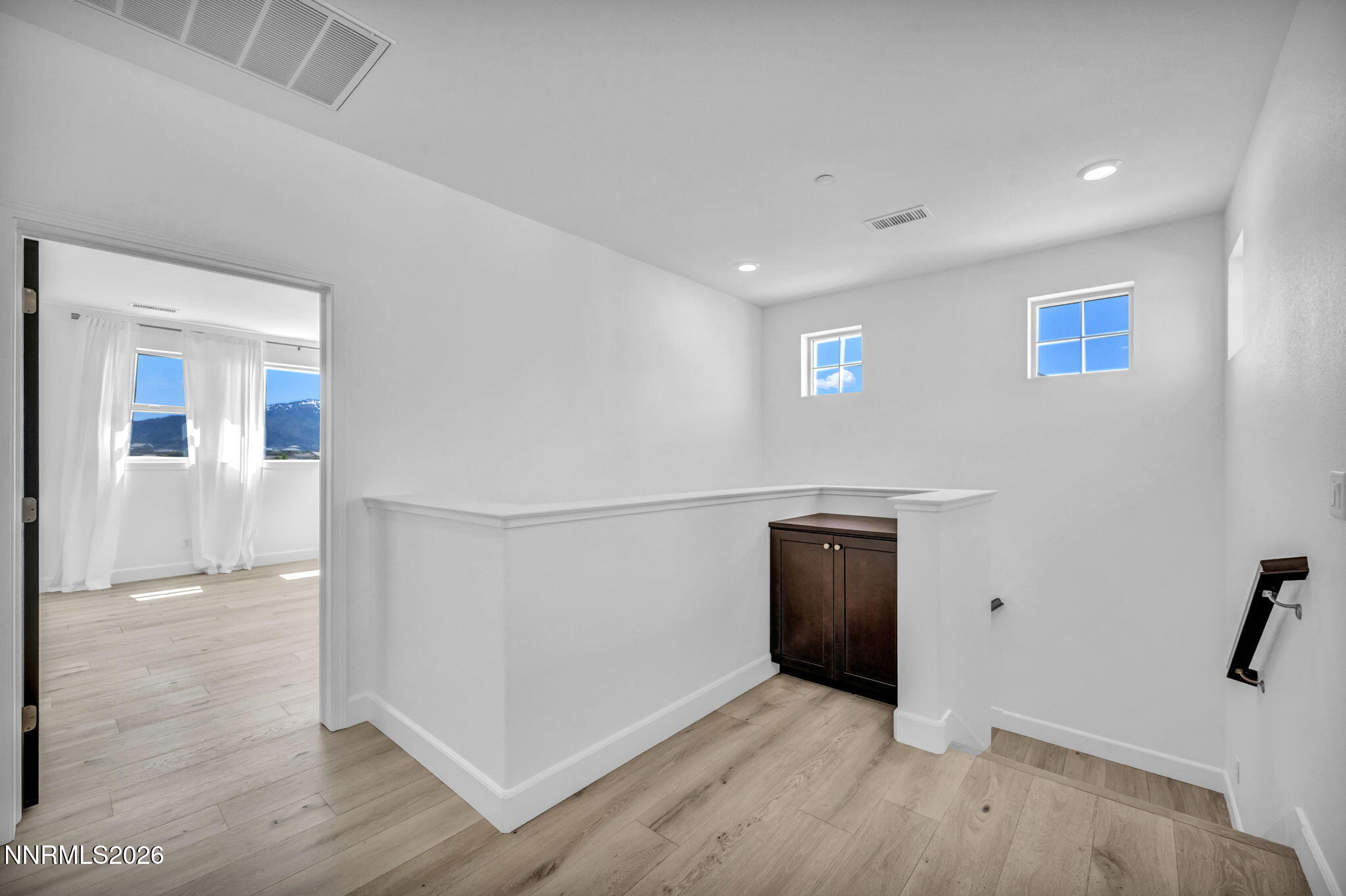 1785 Verdi Vista Court Reno, NV 89523 - Photo 14 of 35 an empty room with wooden floor and entrance