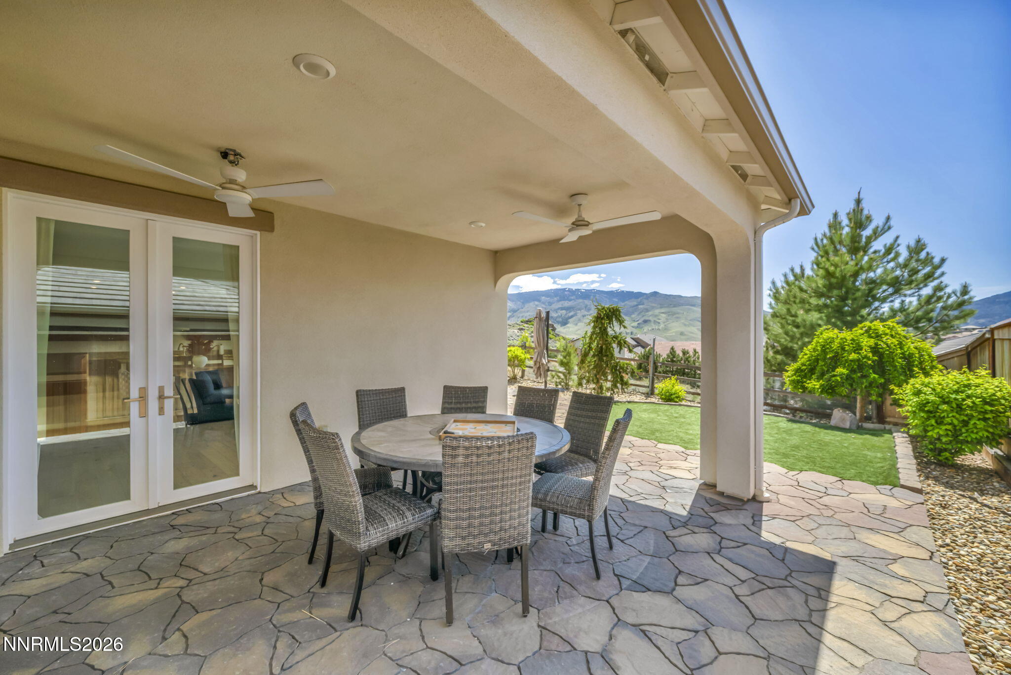 1785 Verdi Vista Court Reno, NV 89523 - Photo 24 of 35 a view of a patio with table and chairs and potted plants