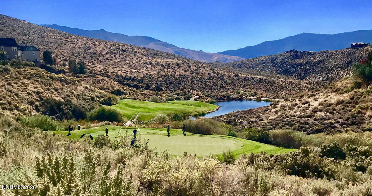 1785 Verdi Vista Court Reno, NV 89523 - Photo 32 of 35 a view of a lush green hillside and a mountain