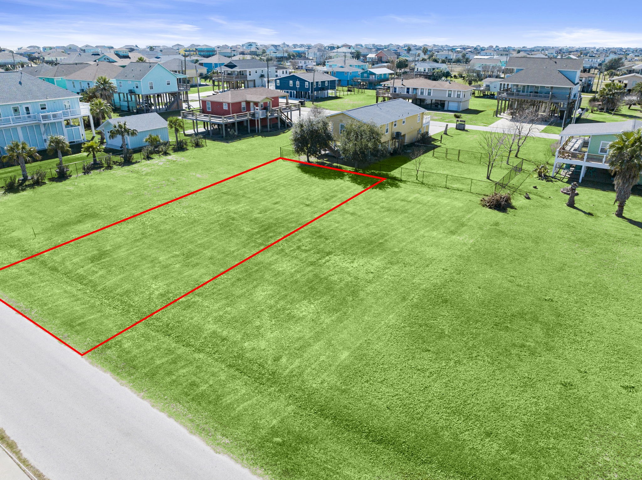 975 Wommack Crystal Beach, TX 77650 - Photo 13 of 17 a view of a garden with houses