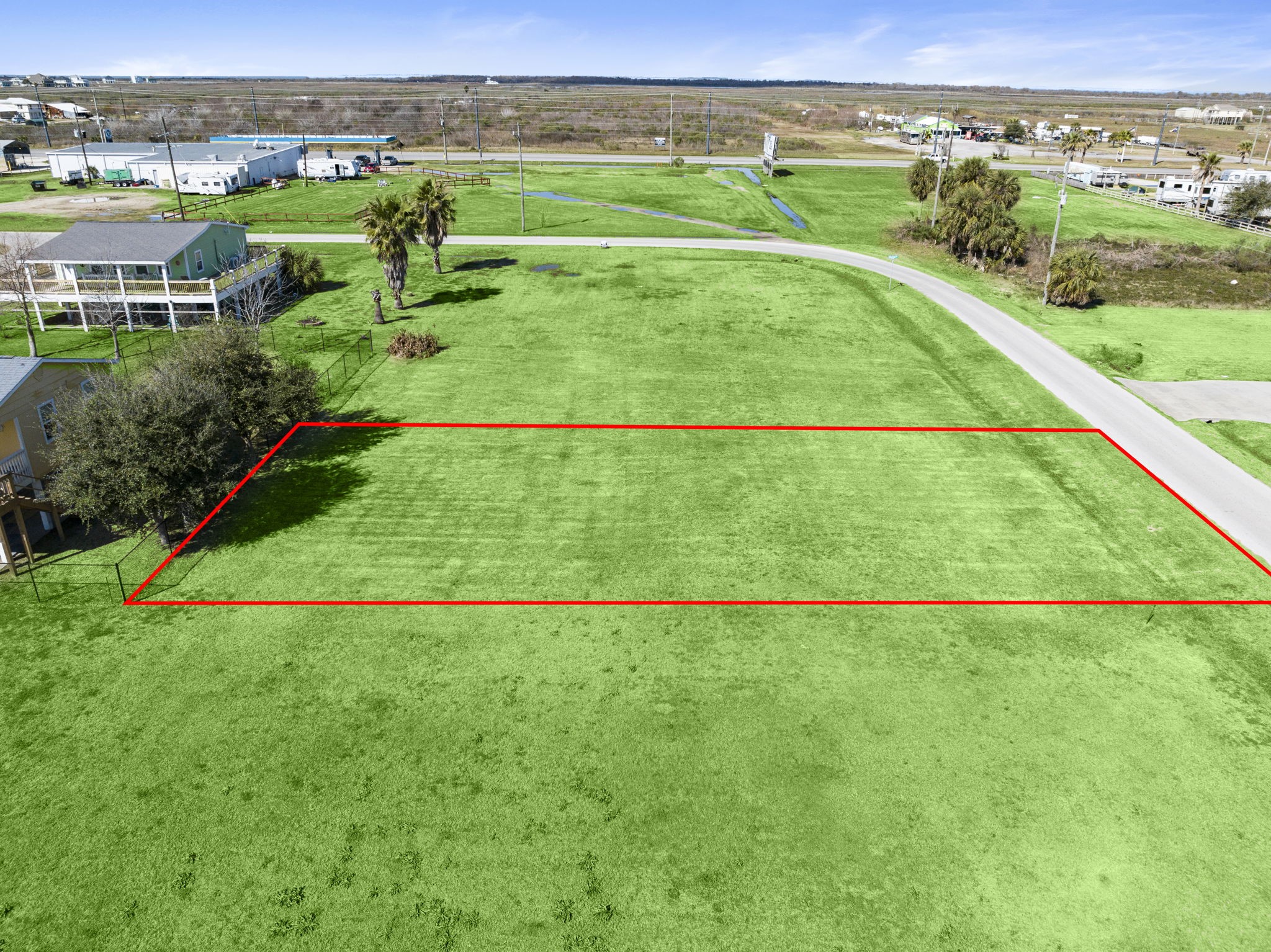 975 Wommack Crystal Beach, TX 77650 - Photo 10 of 17 an aerial view of a football ground