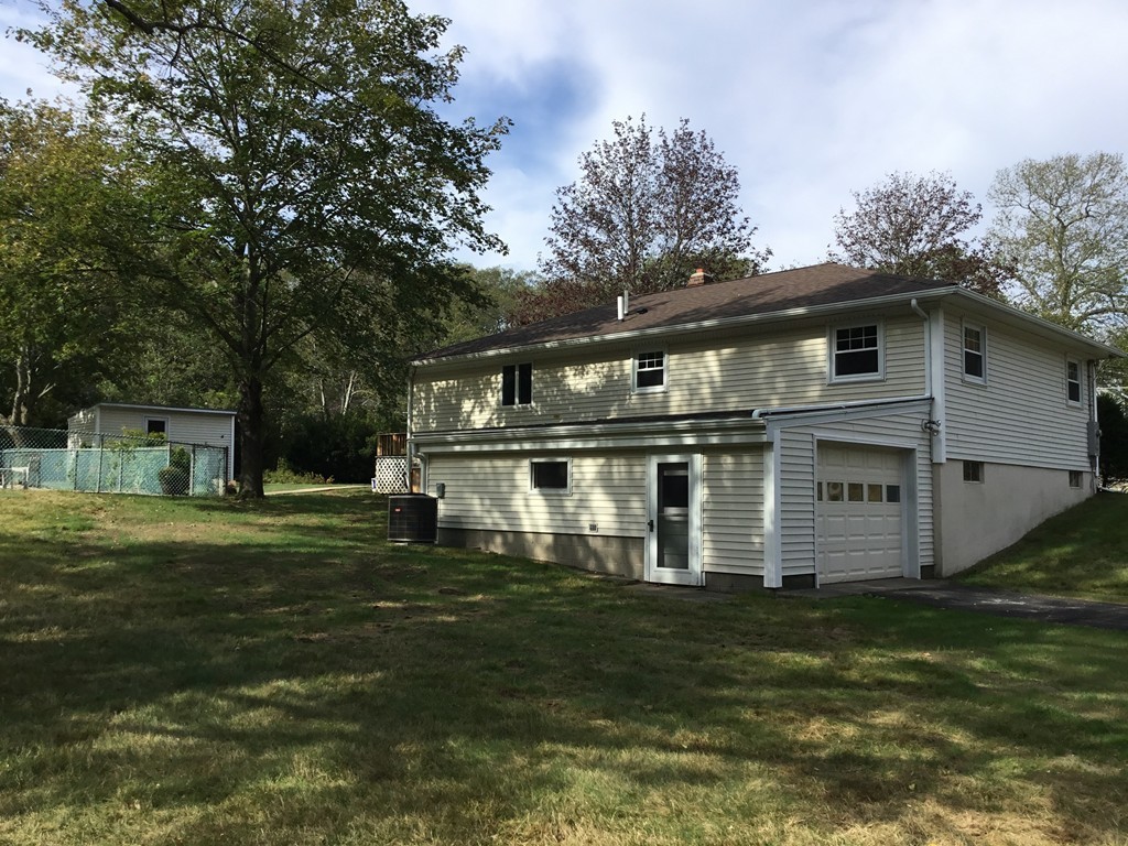29 Boston Road Sutton, MA 01590 - Photo 14 of 16 a front view of a house with a garden