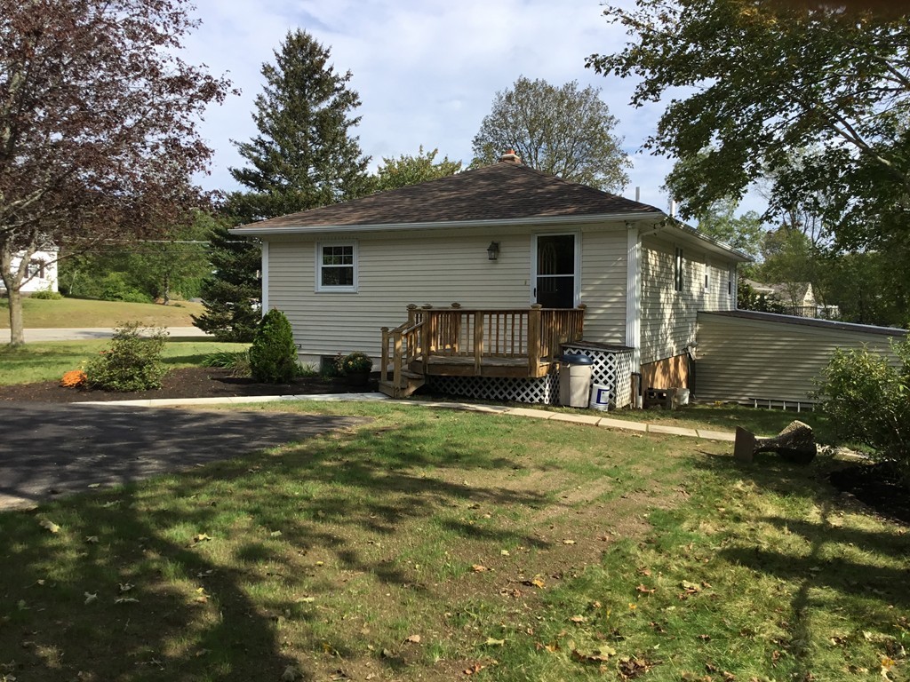 29 Boston Road Sutton, MA 01590 - Photo 15 of 16 a front view of a house with garden
