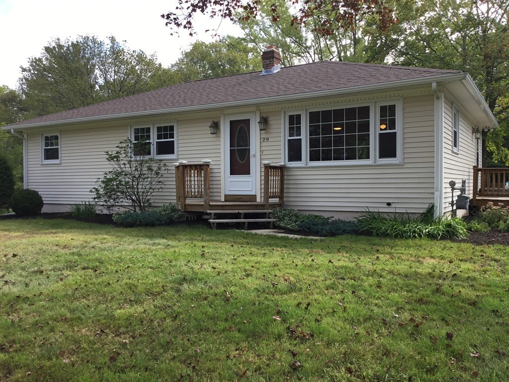 29 Boston Road Sutton, MA 01590 - Photo 2 of 16 a view of a house with a backyard