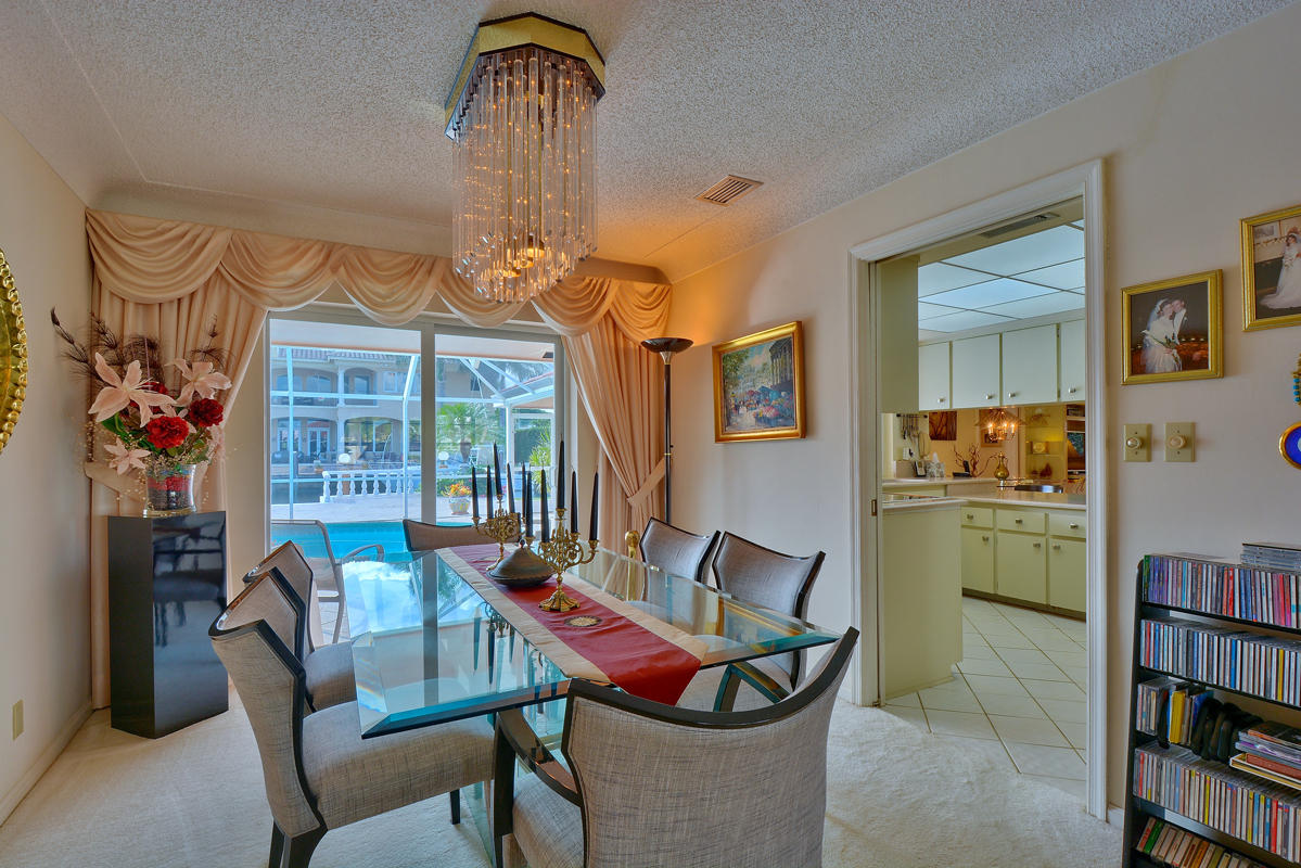 844 Forsyth Street Boca Raton, FL 33487 - Photo 10 of 26 Formal Dining room with sliders to pool