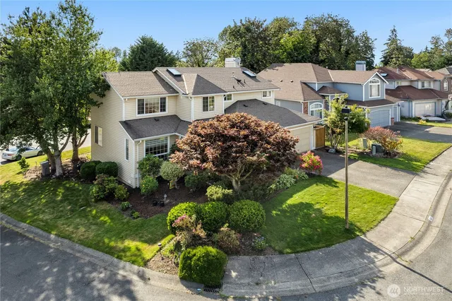 an aerial view of a house with a garden