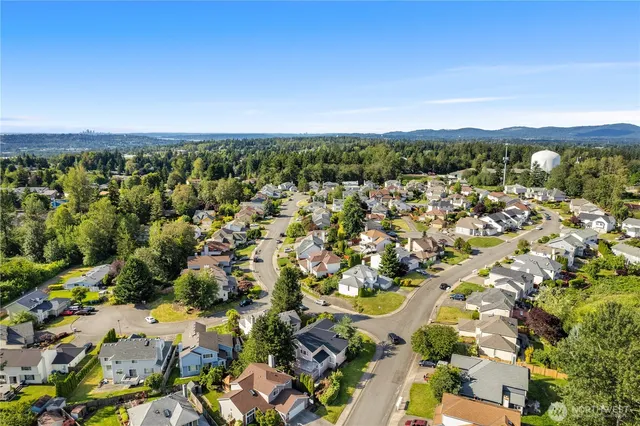 an aerial view of a city with lots of residential buildings