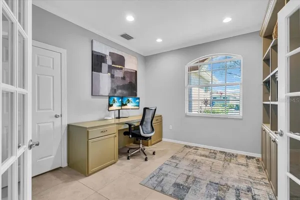 a workspace with furniture and window