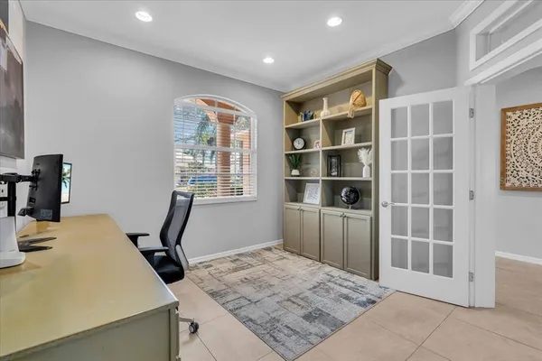 a workspace with furniture and window