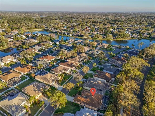 an aerial view of residential building and ocean